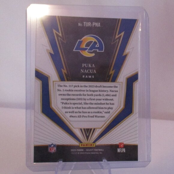 2023 Panini Select TURBOCHARGERED PUKA NACUA Los Angeles Rams Mag & Stand - Picture 3 of 6